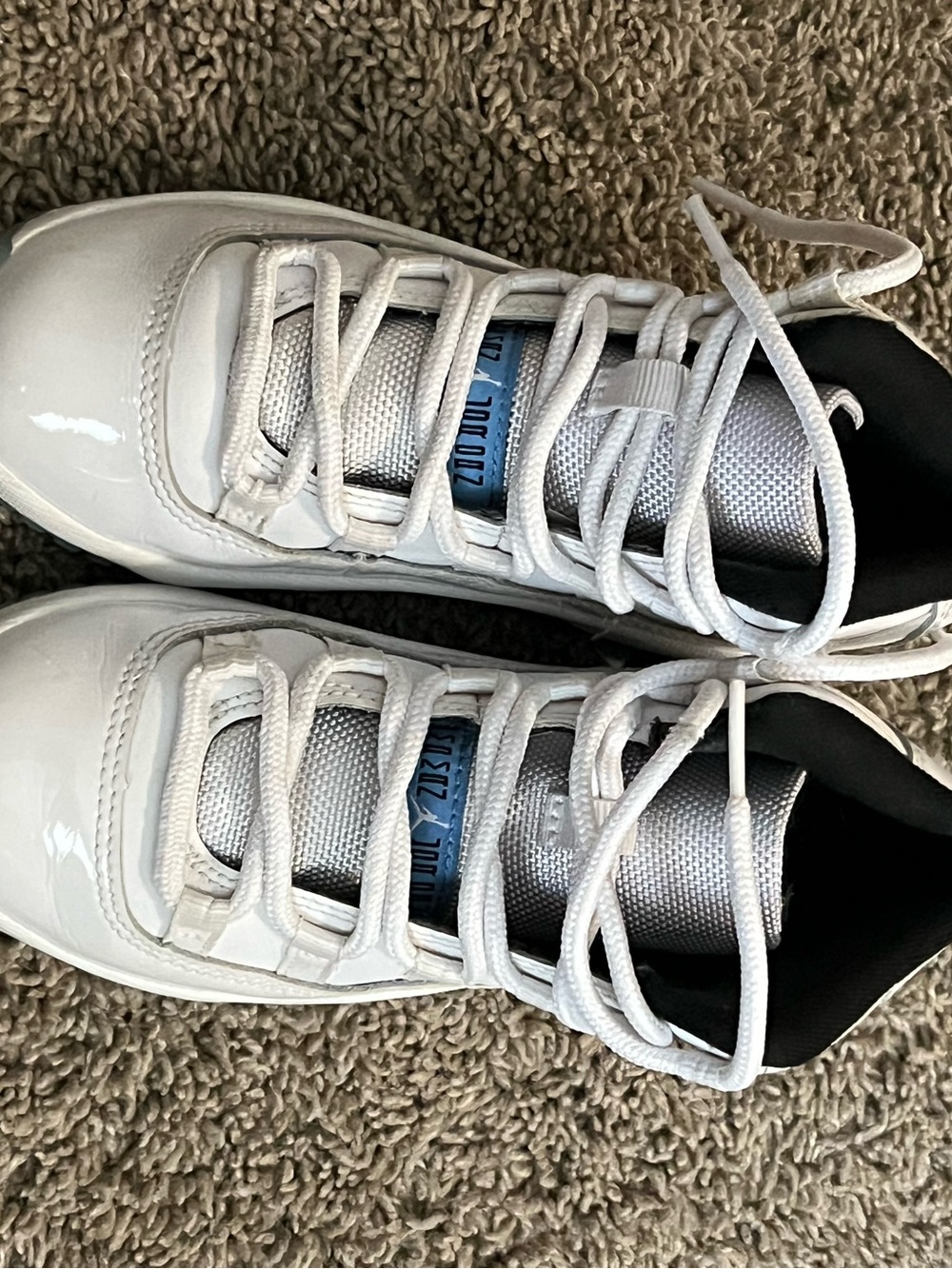 Jordan Kids White Patent Sneakers with Blue Tongue Accent